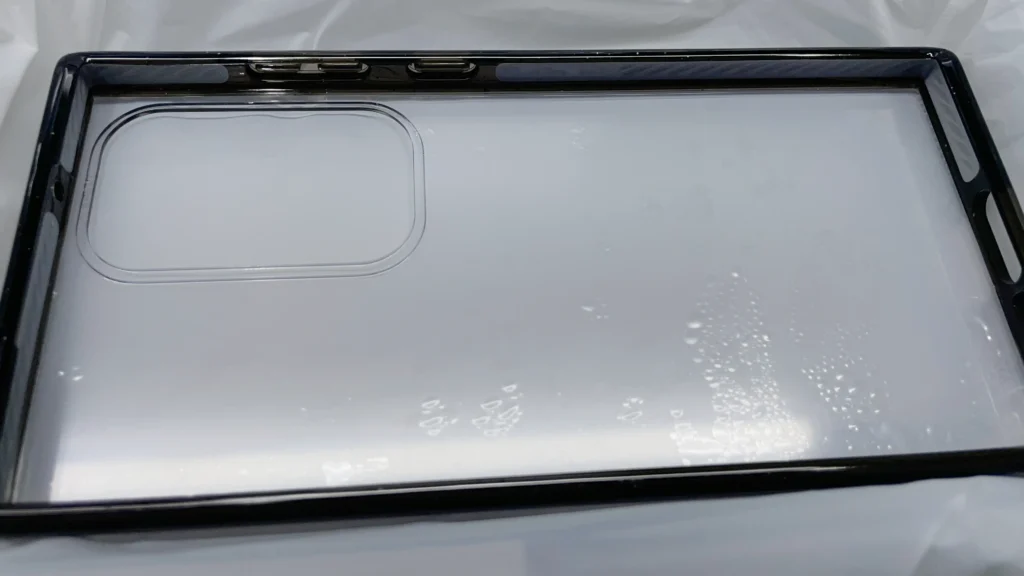 Injection molding of anti-drop strips for transparent phone cases