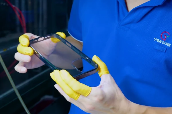 Injection molding engineers inspect golden samples